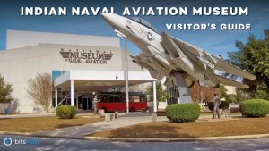 Feature image of the Indian Naval Aviation Museum Visitors Guide showcasing the entrance and displayed aircraft