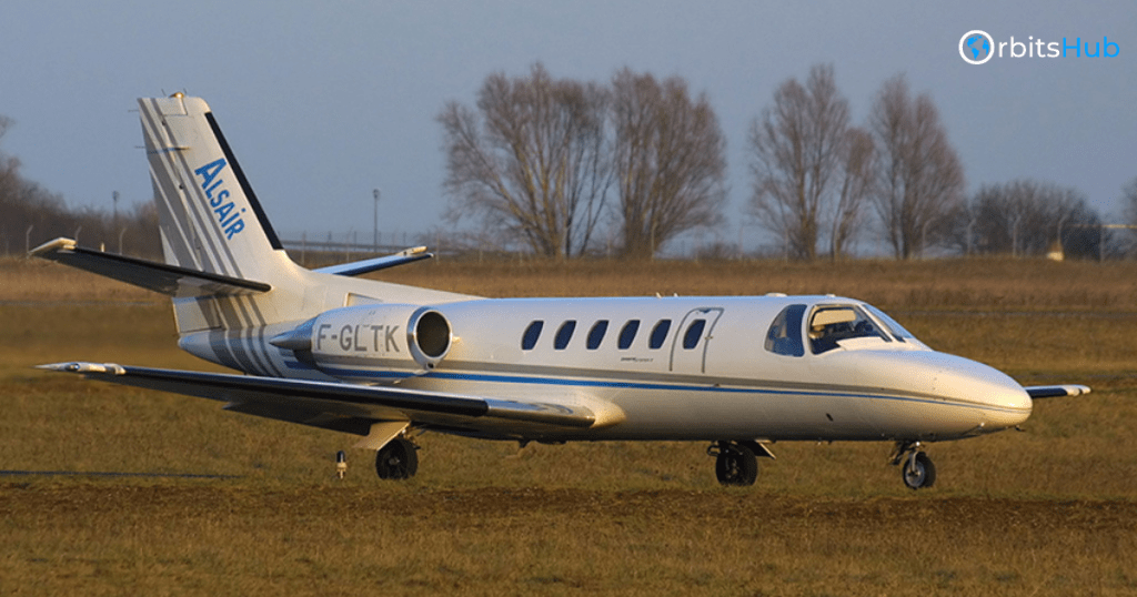 A Cessna C550 Citation II jet preparing for takeoff on a grassy airfield, emphasizing its versatility and design